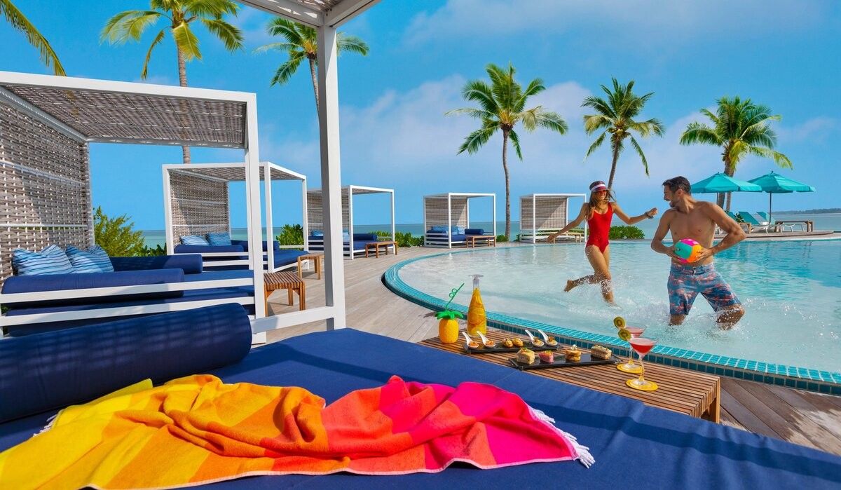 Couple at the Beach Club at Kandima Maldives